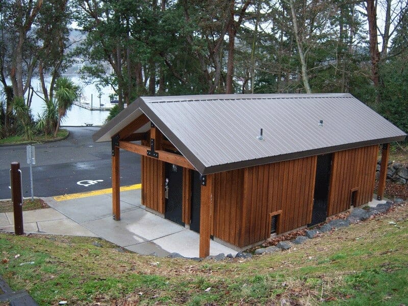 Medium-shower-building-restrooms-with-extra-storage-room Lakeside Shower Building with Restrooms and Cedar Sidingear a lake