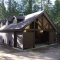 Medium Campground Shower with Shingled Roof and Dormers with Windows