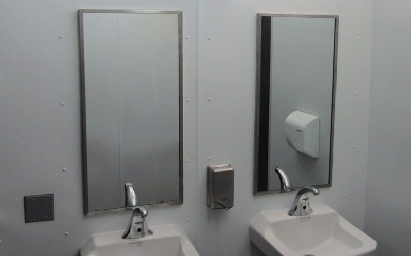 Porcelain Sinks in Restroom Interior