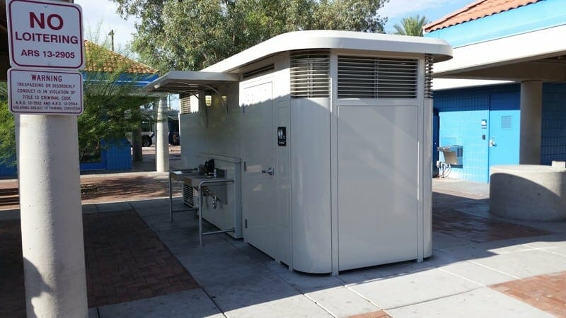 Steel Urban Restroom in Busy City Bus Station