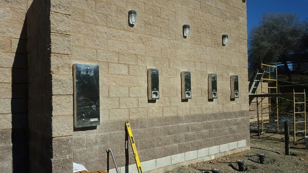 Steel Shower Fixtures On Building Exterior