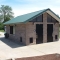 Medium Sized Concession Facility with Bathrooms and Green Metal Roofing