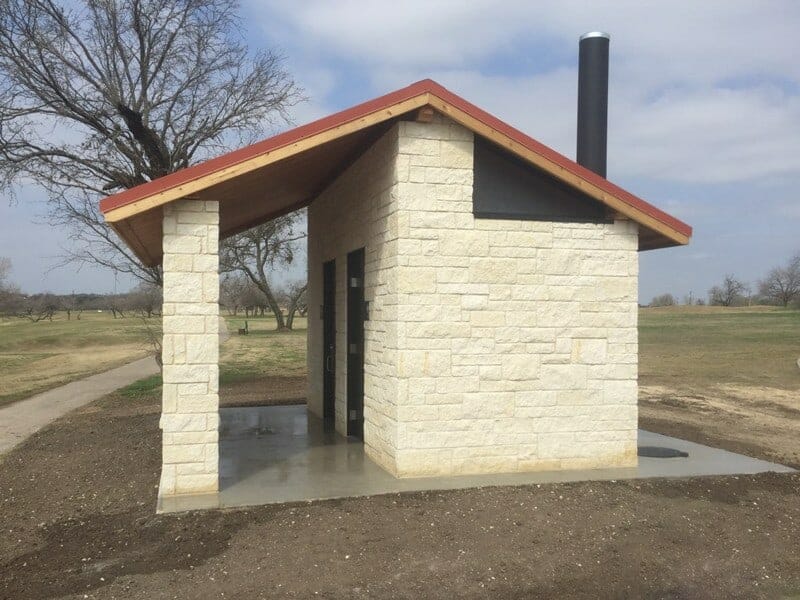 texas-limestone-veneer-on-golf-course-vault-restroom Remote Vault Restroom on Midway Marker at Golf Course