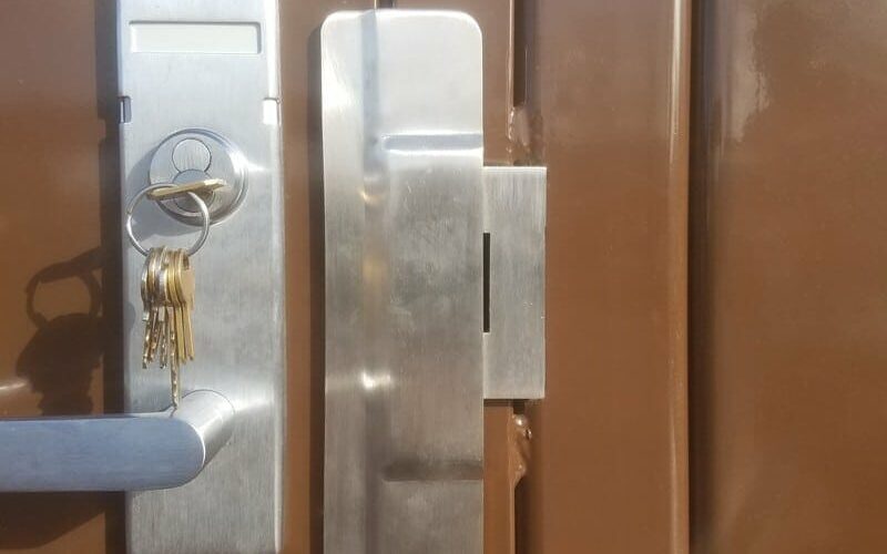 Door with Durable Stainless Steel Locking Mechanism with Protection