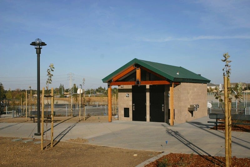 Restroom with Timber Beam Roof Extension
