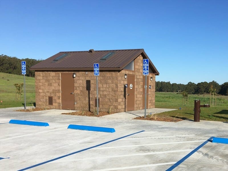 Concrete Restroom with Four Rooms