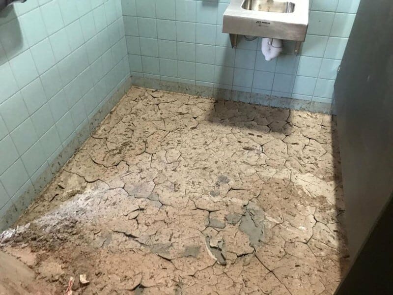 Result of Flooded Interior in Public Restroom Building