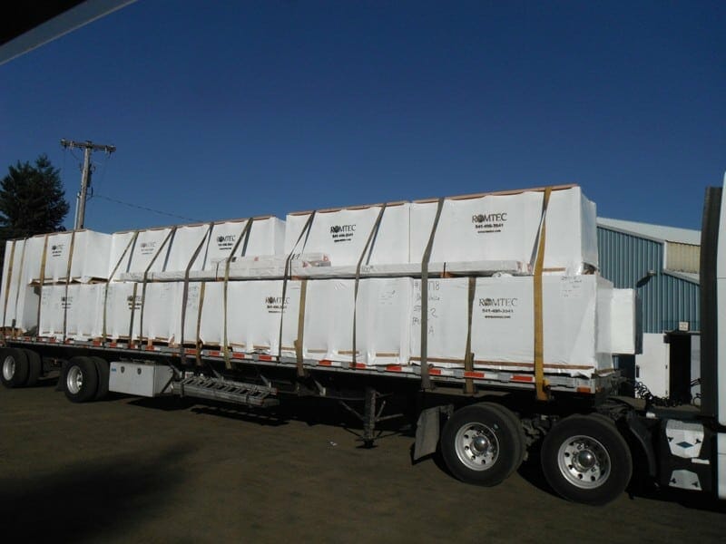 Shrink Wrapped Supply Pallets on Delivery Truck