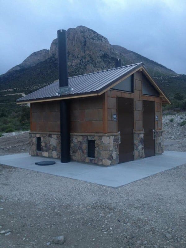 Compact Double Vault Restroom with Stone Exterior