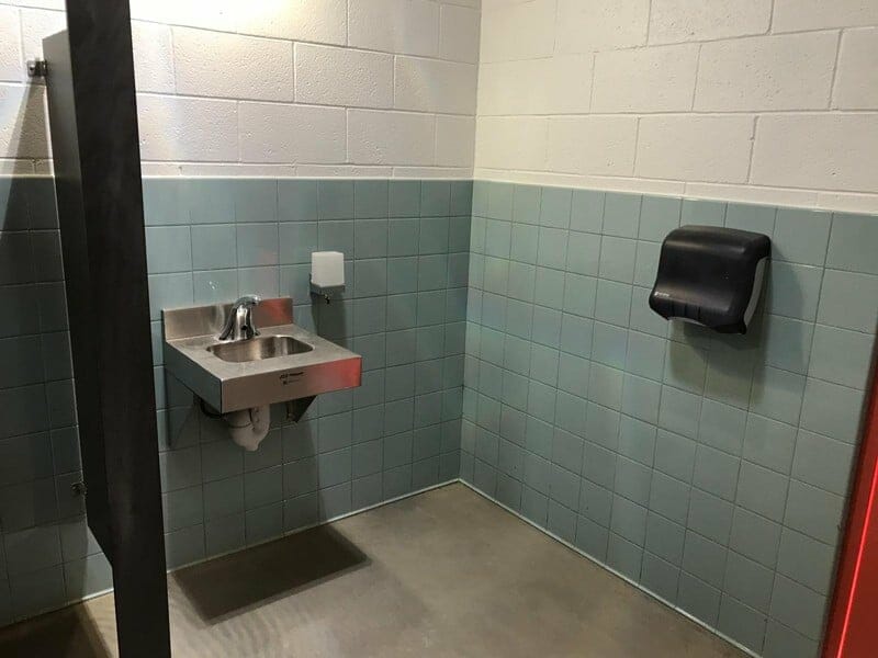 Blue Tile Interior of Restroom Building