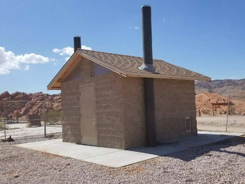 Waterless Restroom with Colored CMU Exterior and Shingles