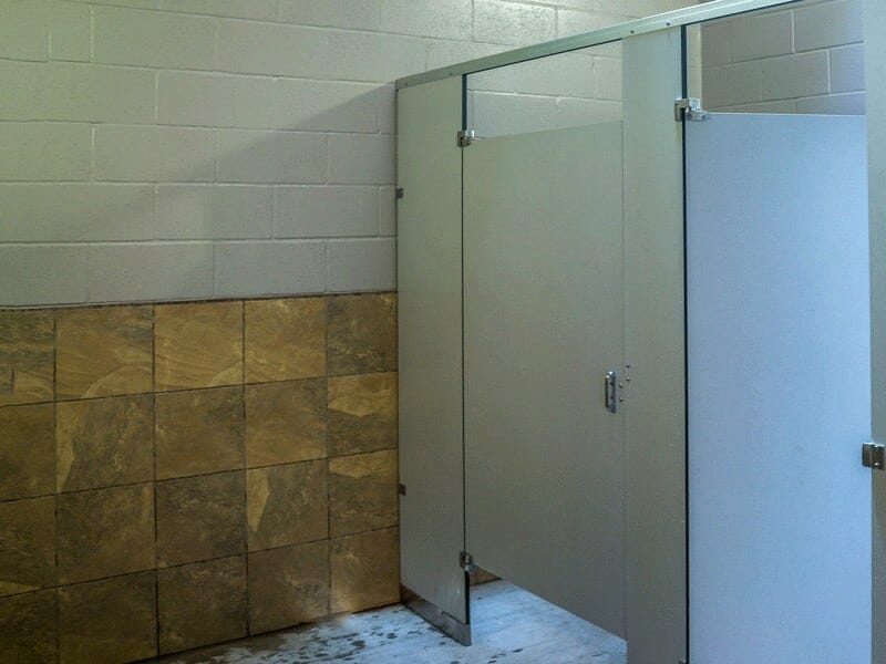 Painted Concrete Wall with Tile Wainscoting