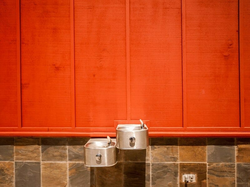 Steel Drinking Fountains on Front of Restroom