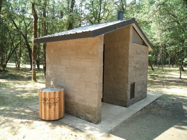 Trash Can Holder Near Waterless Restroom