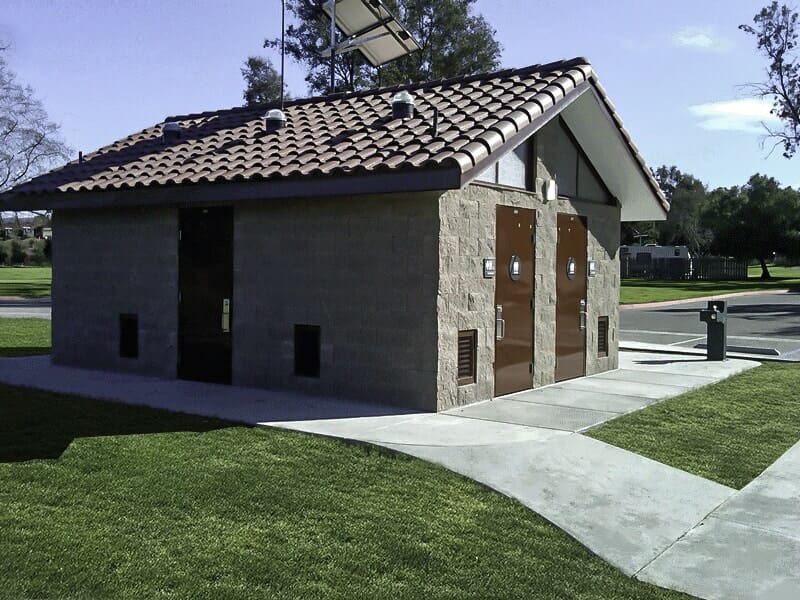 Small Shower Building with Solar Panels at a Campground Setting