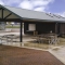 Large Concession with Roof Extension and Picnic Tables