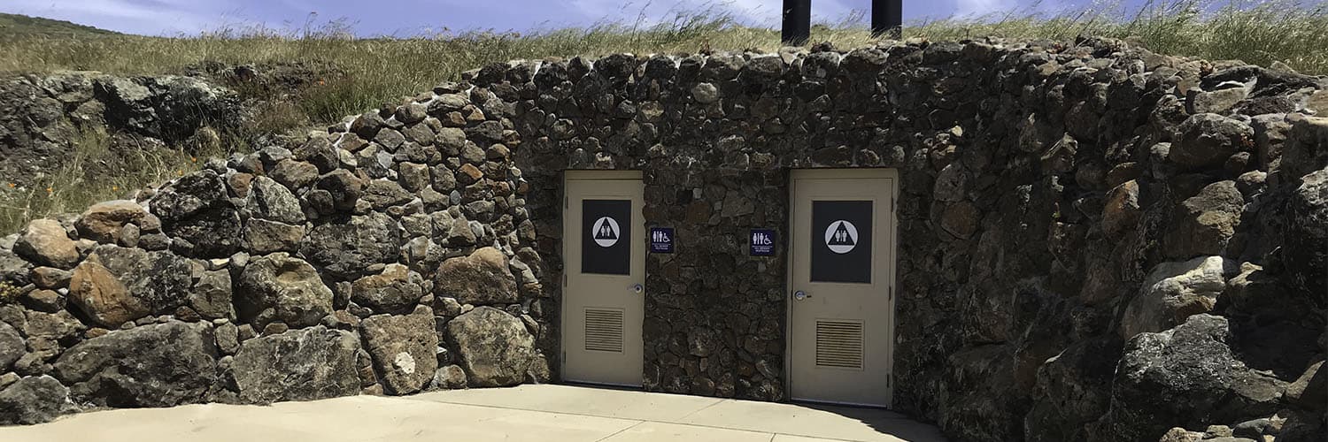 Camouflaged Waterless Restroom Building