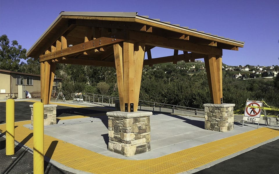 Medium Dimensional Lumber Pavilion with Custom Post Detail at Public Bus Stop