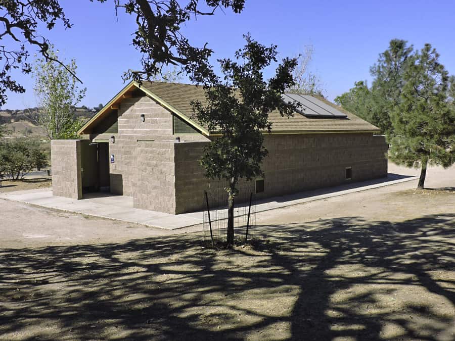 Concrete-block-structure-with-showers-restrooms-solar-panels Medium Showers Building with Solar Panel Package