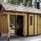 Dry Vault Restroom with Log Exterior and Roof Extension