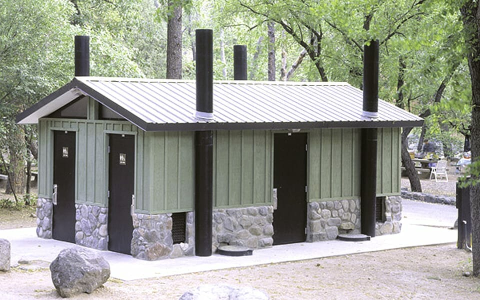 Large Waterless Restroom with Green Board and Batten at Campground Site