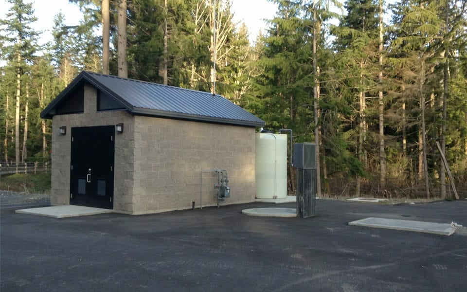 Large Utility Building for Equipment Storage and Water Tanks
