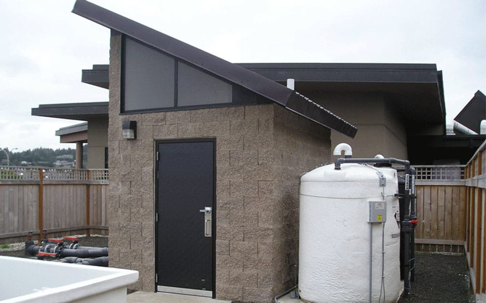 small-utility-storage-building-cement-structure Small Storage Building with Steel Roofing and Features