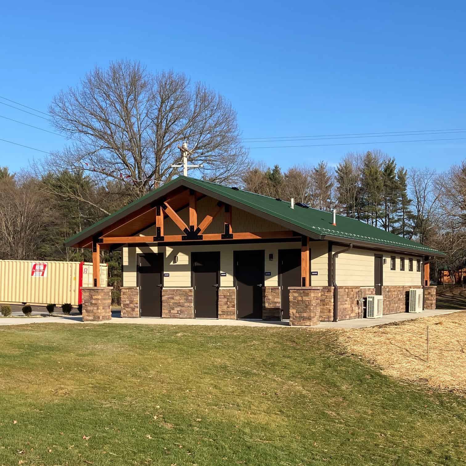 Restroom Building with Extended Roof at Entrance