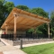 Small Lumber Amphitheater Covering Picnic Tables