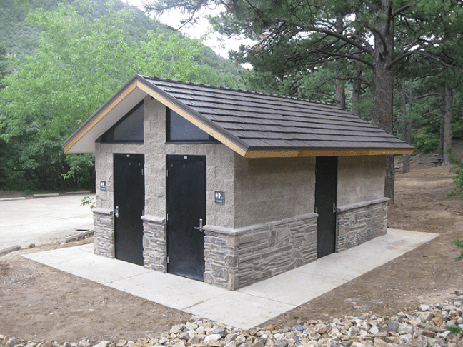 Multi-Room Shower Restroom with Natural Stone Veneer Walls
