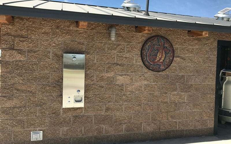 Restroom with Exterior Shower Fixture