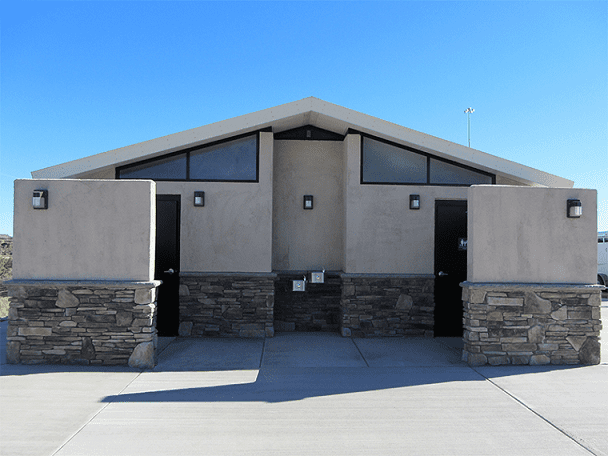 Large Shower Facility with Bathrooms and Stucco Stone Siding Package