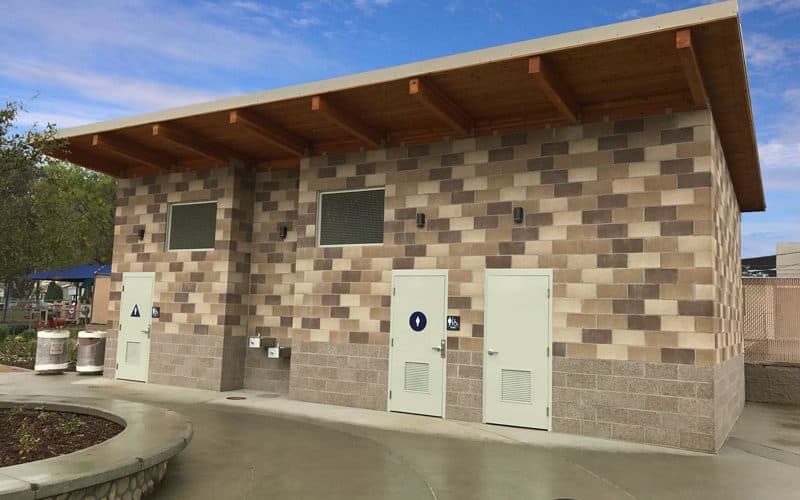 Single Pitch Roof Restroom with Colored Block Arranged in Pattern