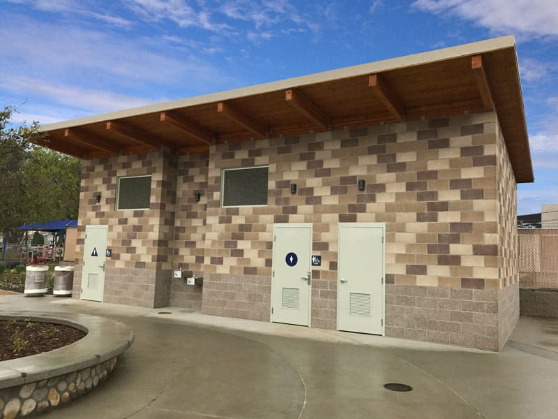 Single Pitch Roof Restroom with Colored Block Arranged in Pattern