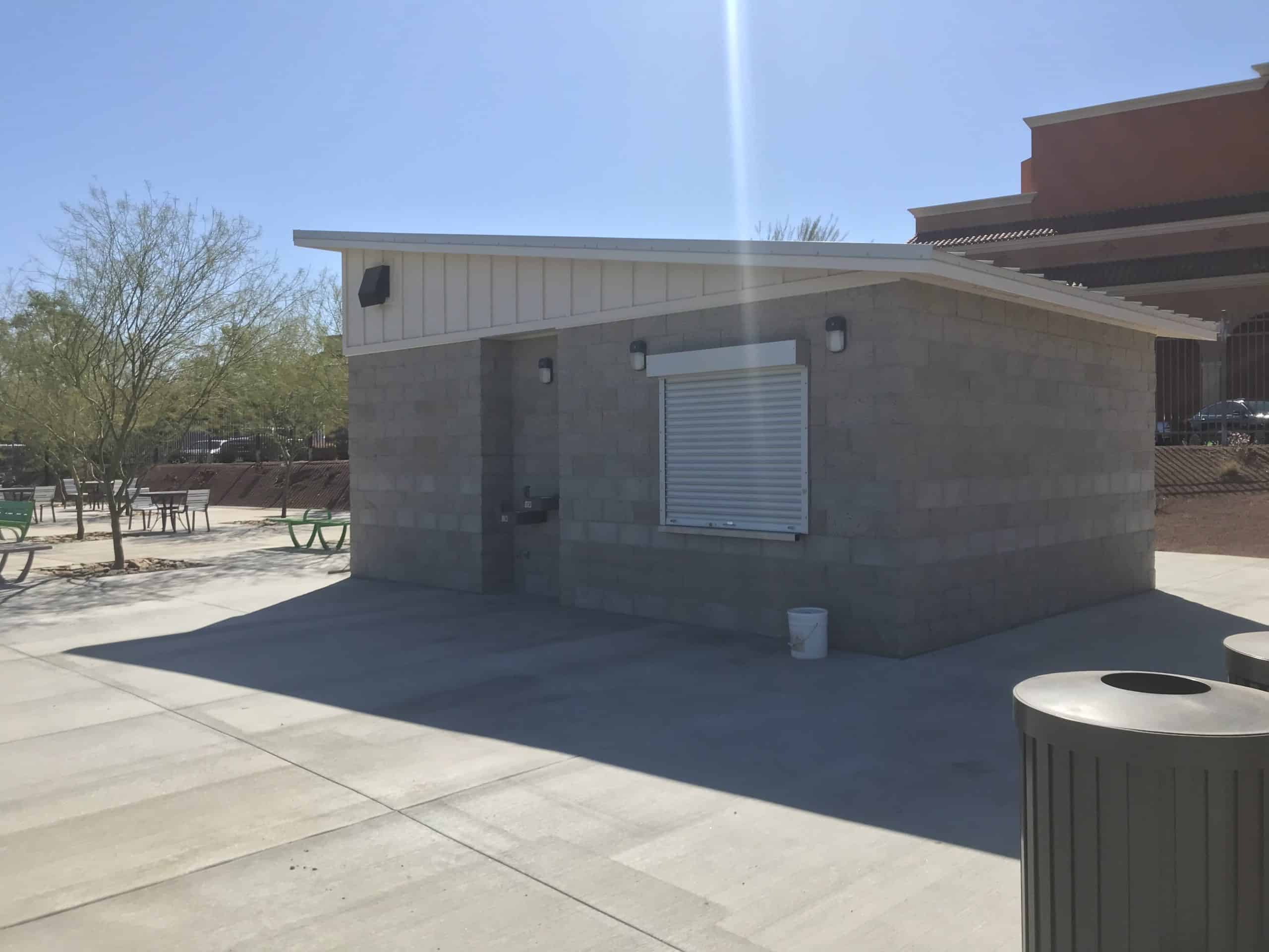 concession window on cement block structure