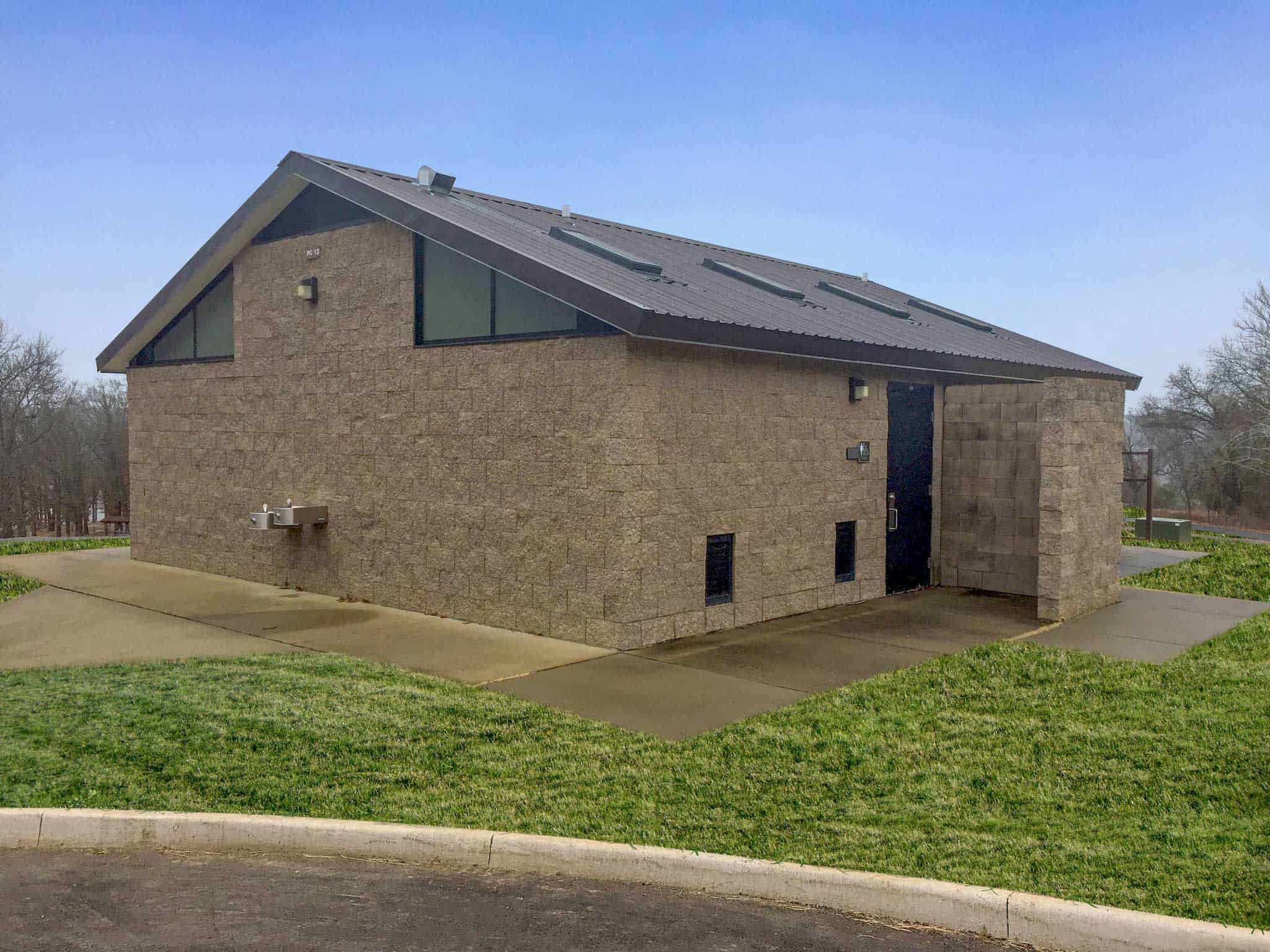 Large Multi-User Shower Building with Restrooms for Recreation Site