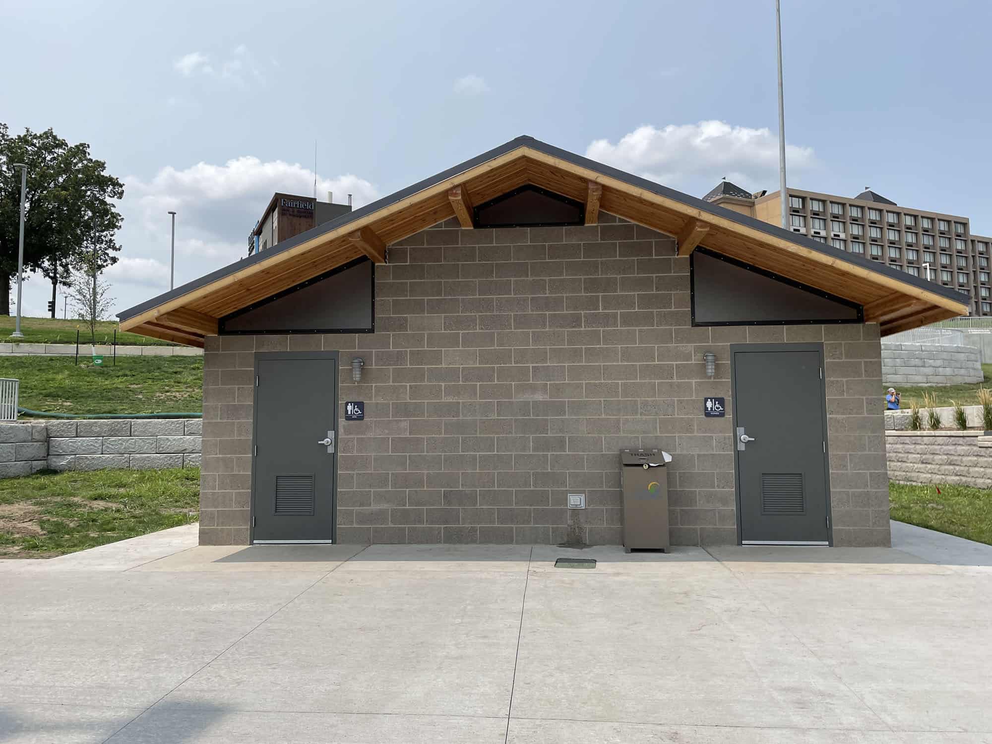 Cement block bathroom structure with metal roofing