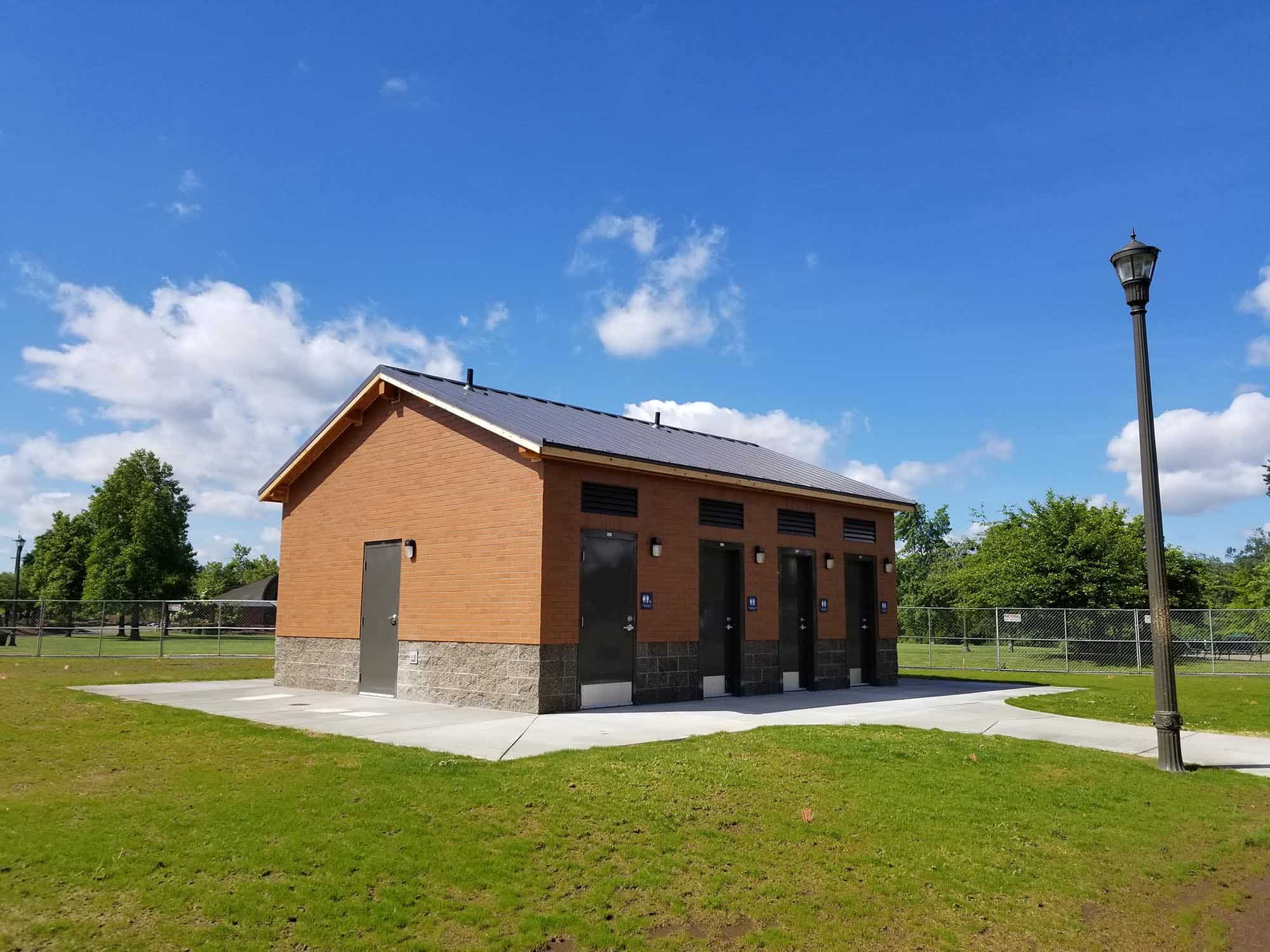 Public restroom building with brick and cement block structure