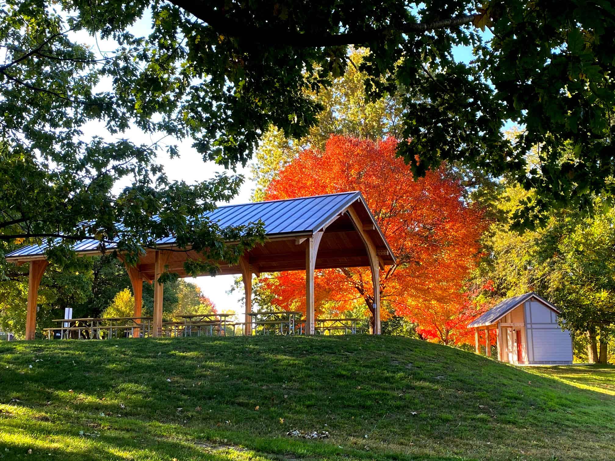 Matching restroom and pavilion at scenic park in iowa city