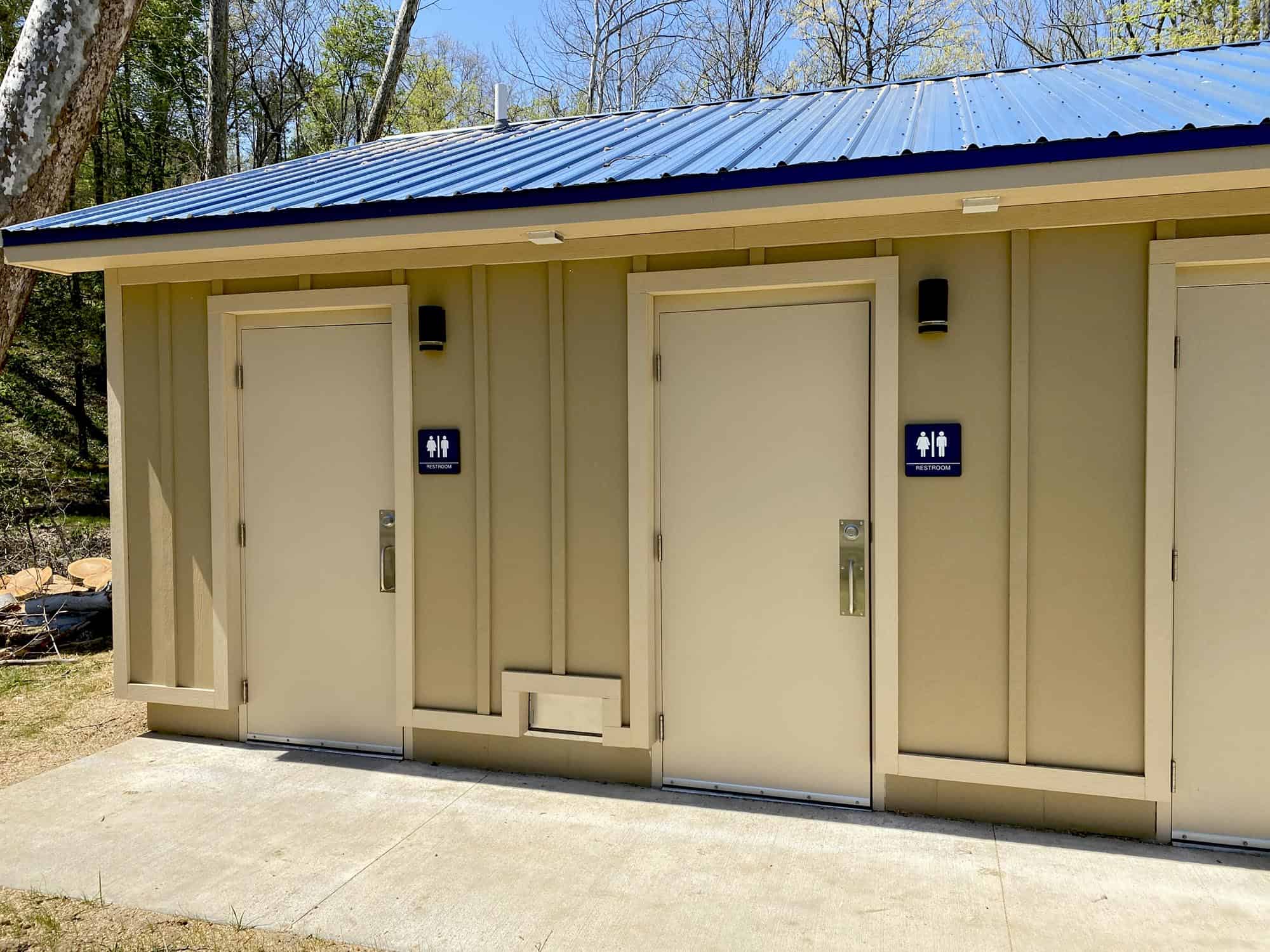 Unisex restroom building with multple single rooms