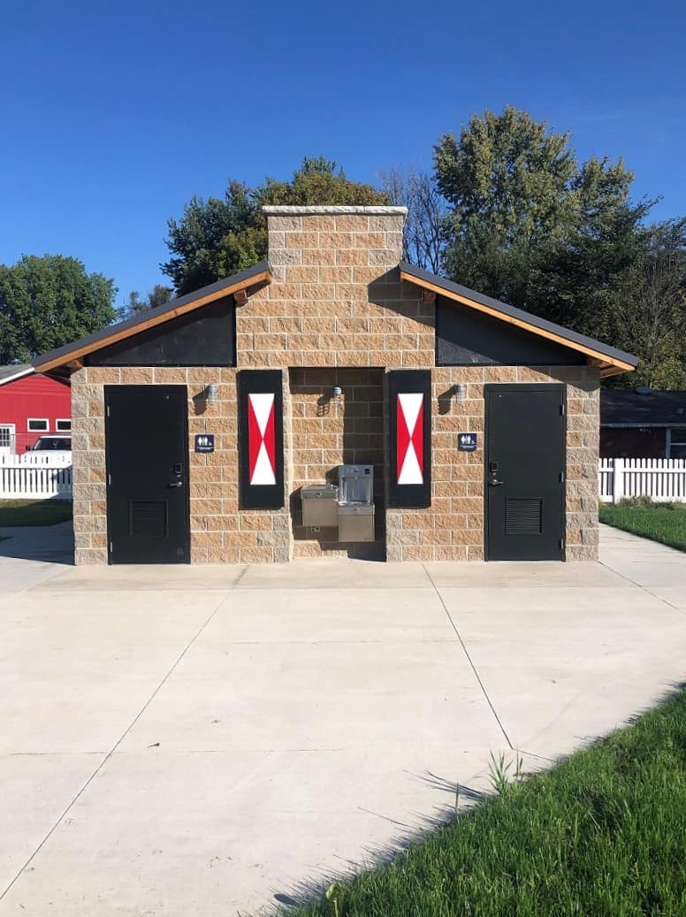 Pella-Kiwanis-Park-Unisex-Restrooms Cement Block Restroom Building with Dutch Theme