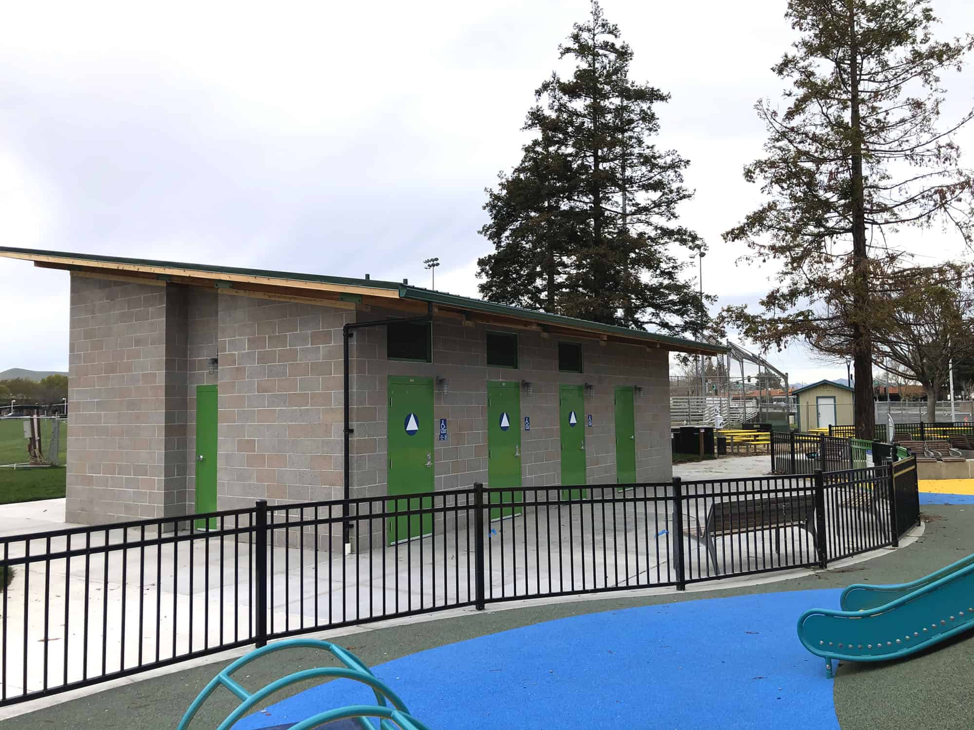 Single Sloped Public Restroom with Multiple Unisex Rooms
