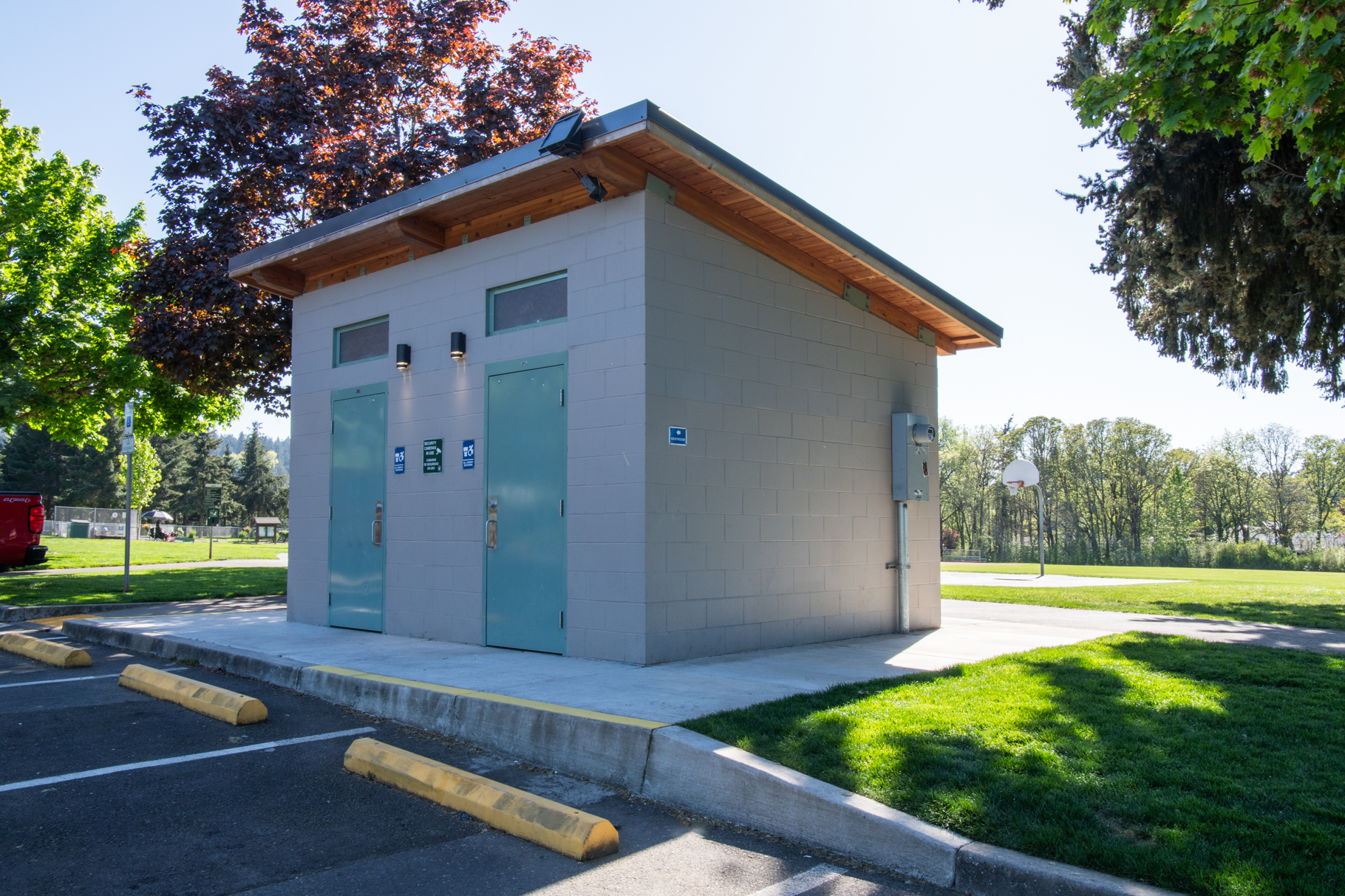 two user restroom with a single slope