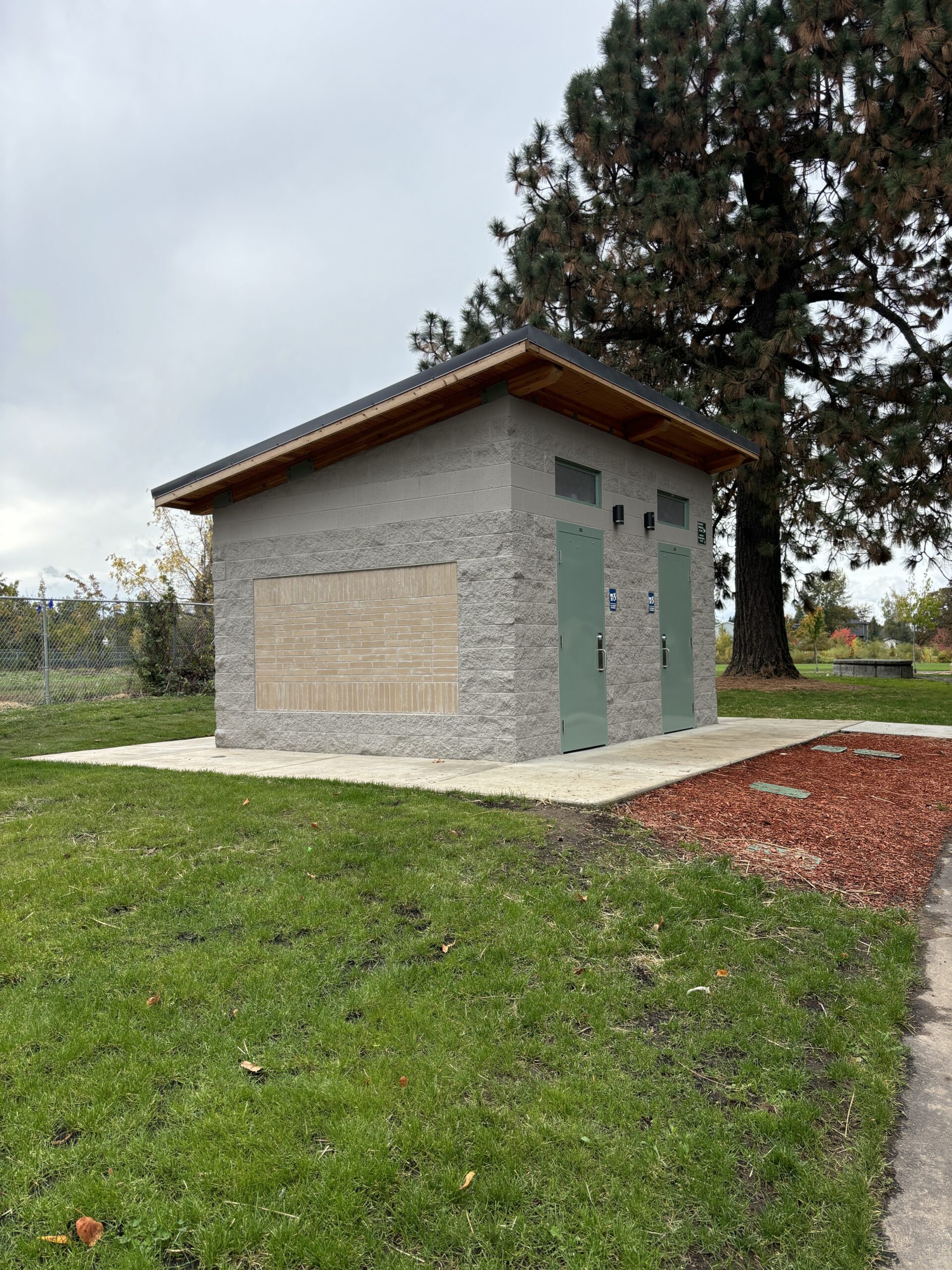 side view of a 2 user restroom